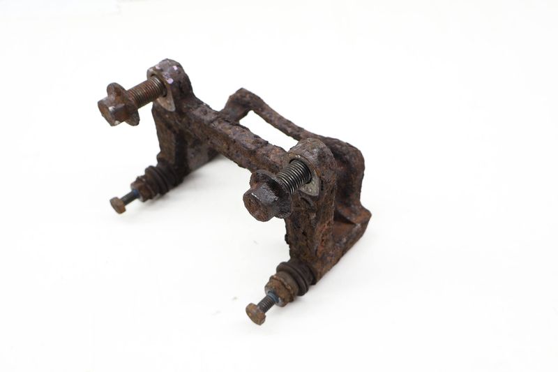 Brake Caliper Carrier / Mount Bracket 7D0615425A — Used (SKU 717891)