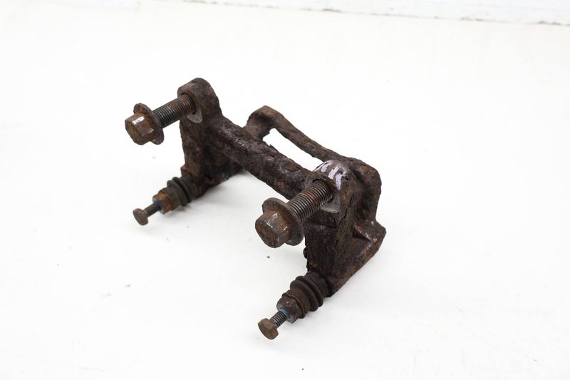 Brake Caliper Carrier / Mount Bracket 7D0615425A — Used (SKU 717892)