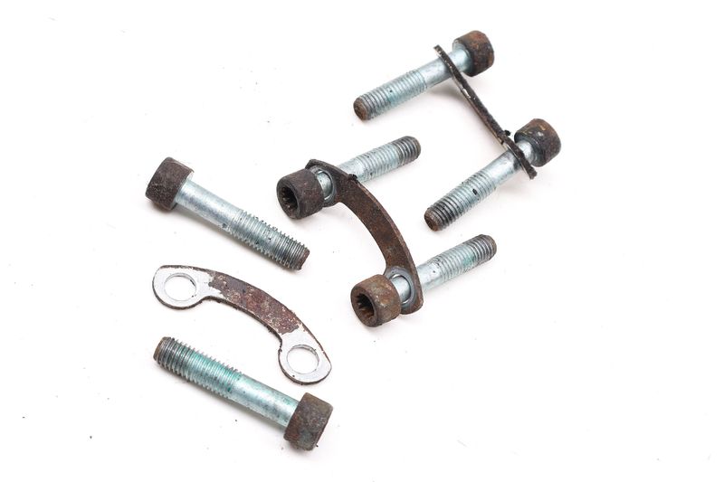 CV Axle Bolt w/ Retaining Bracket Set N90668201 — Used (SKU 735191)