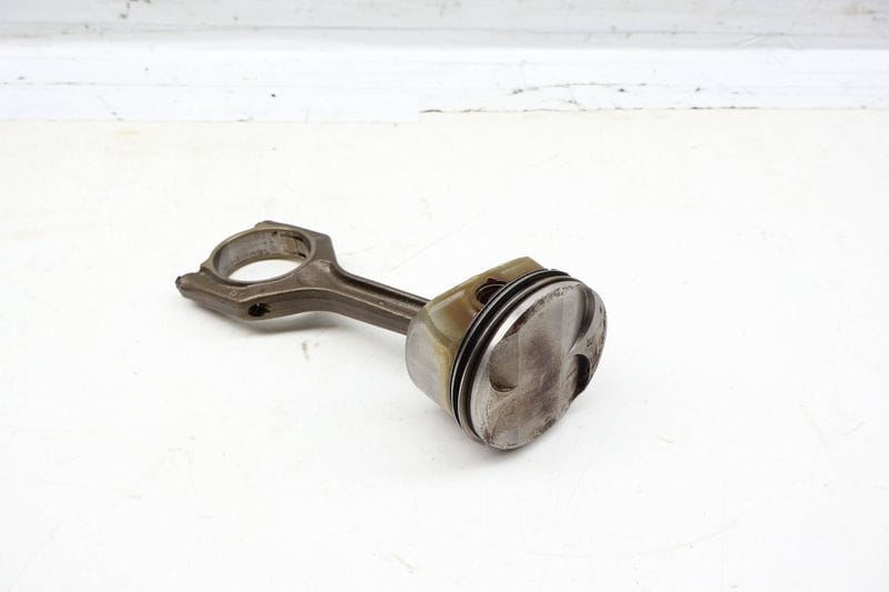 Piston w/ Connecting Rod 11257558528 — Used (SKU 704458)