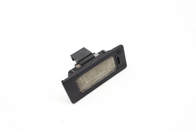 License Plate Light 8T0943021 — Used (SKU 717079)