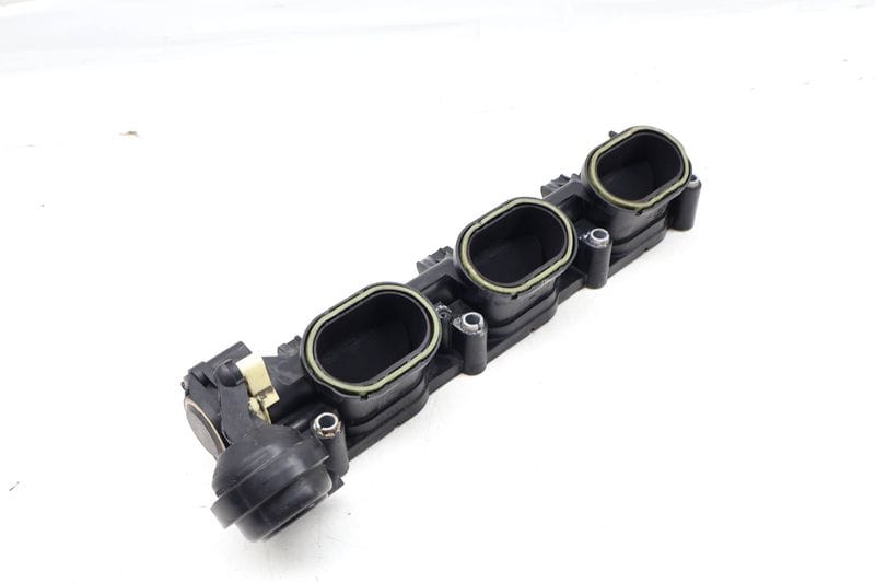 Lower Intake Manifold Air Distribution Housing 06E133109AF — Used (SKU 664928)