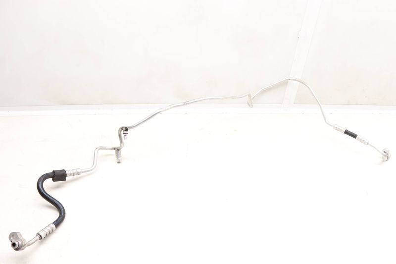 AC Hose / Line / Pipe 97057310510 — Used (SKU 543860)