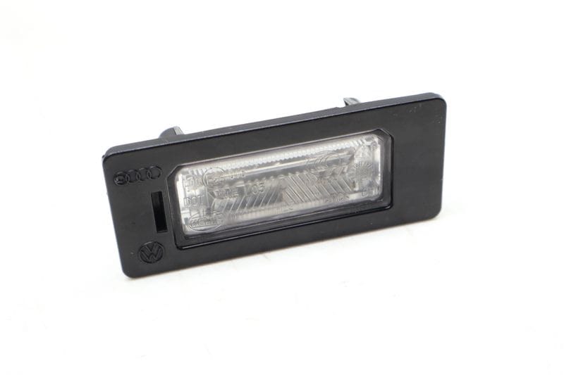 License Plate Light 8T0943021 — Used (SKU 658680)