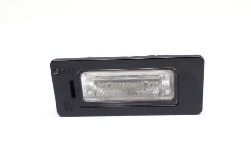 License Plate Light 8T0943021 — Used (SKU 722739)