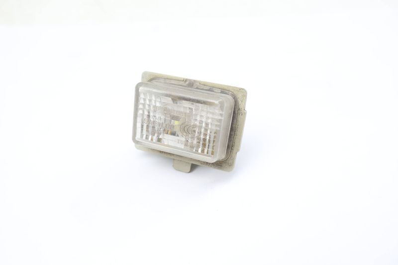 License Plate Light 2218200856 — Used (SKU 681750)