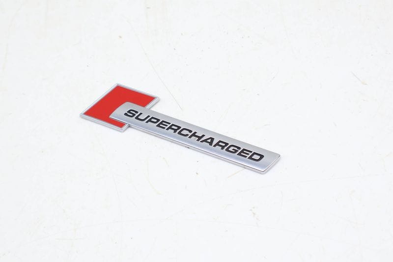 Fender Emblem / Badge (SUPERCHARGED) 4F0853601A — Used (SKU 682942)