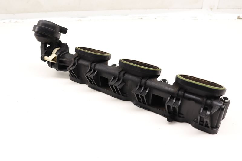 Lower Intake Manifold Air Distribution Housing 06E133110AL — Used (SKU 605565)