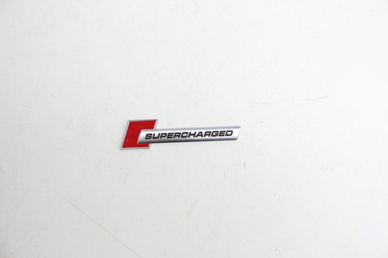 Fender Emblem / Badge (SUPERCHARGED) 4F0853601A — Used (SKU 709878)