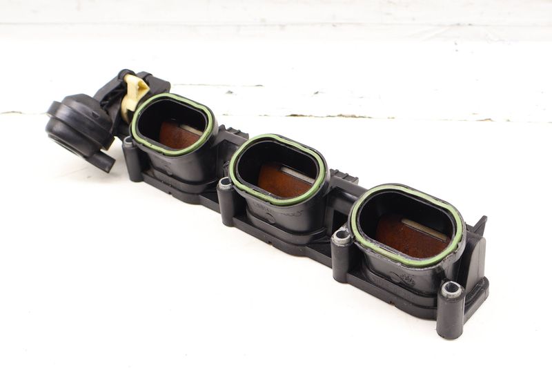 Lower Intake Manifold Air Distribution Housing 06E133109AK — Used (SKU 706469)
