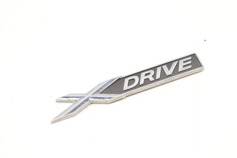 Emblem / Badge (XDRIVE) 51147318576 — Used (SKU 428989)