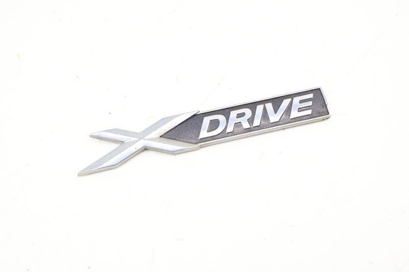 Emblem / Badge (XDRIVE) 51147318576 — Used (SKU 690523)