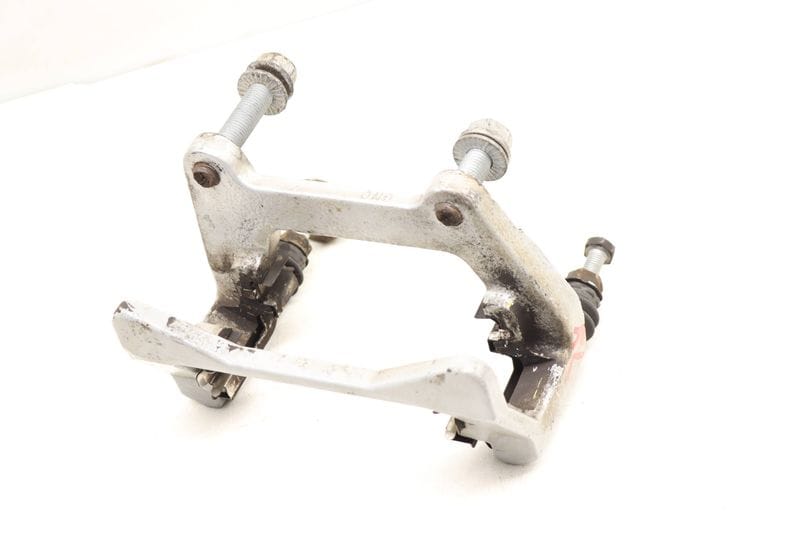 Brake Caliper Carrier / Bracket 95B615425C — Used (SKU 487651)
