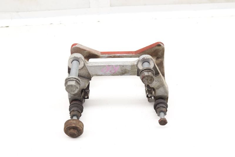 Brake Caliper Carrier / Bracket 95B615426C — Used (SKU 576246)