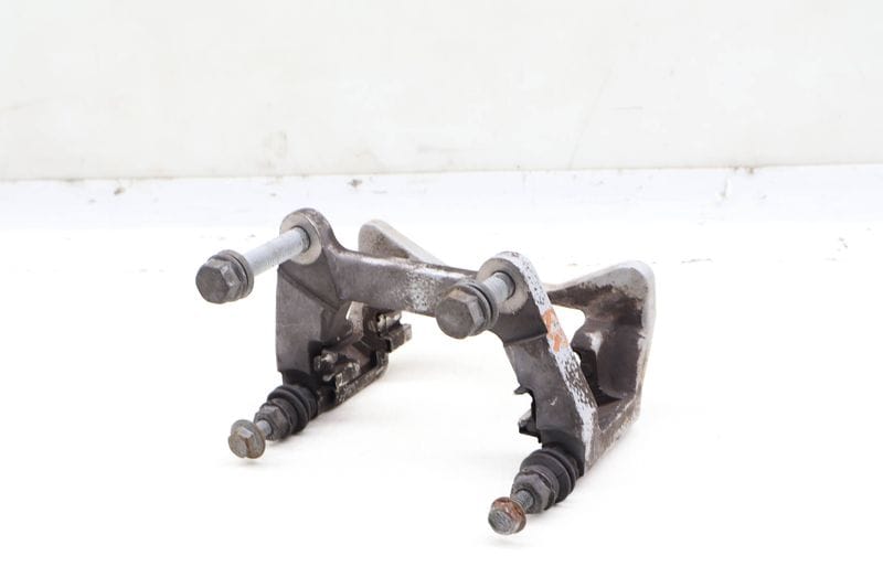 Brake Caliper Carrier / Bracket 95B615426C — Used (SKU 657567)