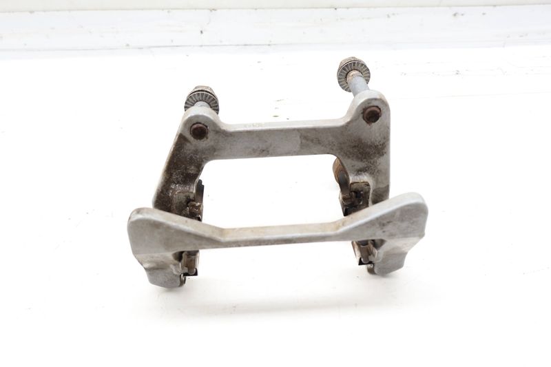Brake Caliper Carrier / Bracket 95B615426C — Used (SKU 730465)