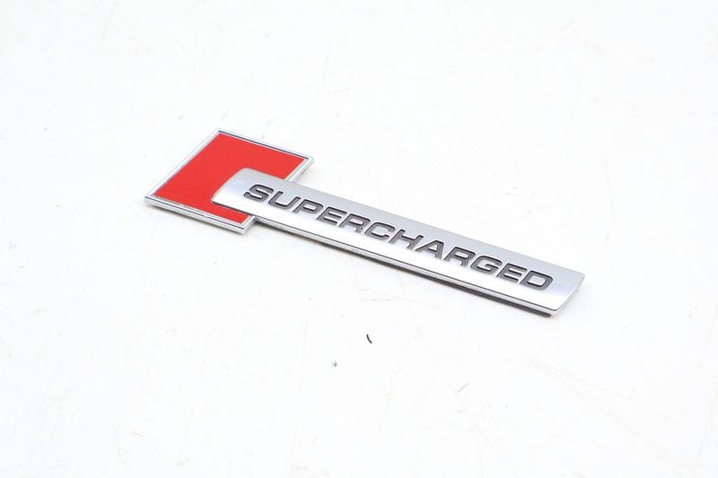 Fender Emblem / Badge (SUPERCHARGED) 4F0853601A — Used (SKU 695183)