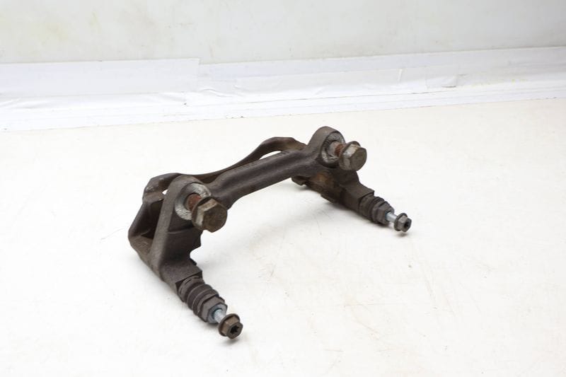 Brake Caliper Carrier / Bracket 5QM615126 — Used (SKU 680312)