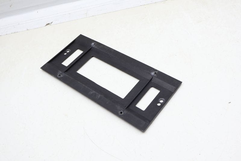 License Plate Mount Bracket 1KM827211B — Used (SKU 680272)