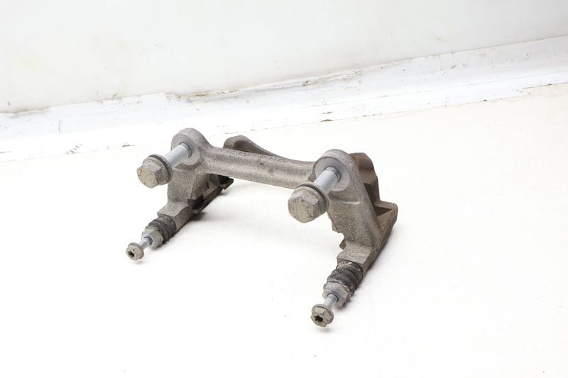 Brake Caliper Carrier / Bracket 8V0615126A — Used (SKU 668465)