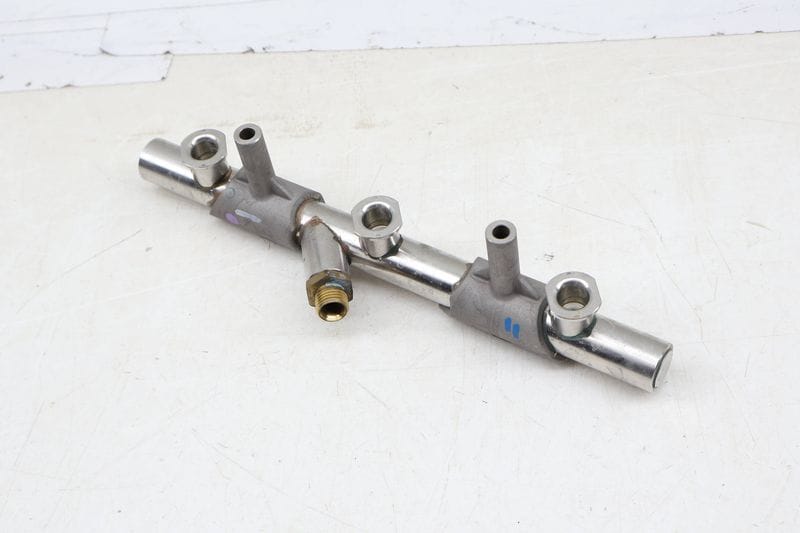 Fuel Rail / Pipe 06E130090AJ — Used (SKU 666557)