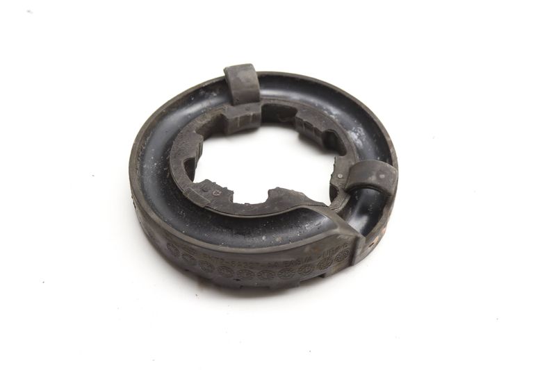 Upper Spring Pad / Mount FK725A327AA — Used (SKU 581292)