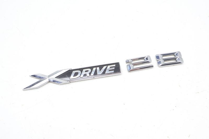 Door Emblem / Badge (XDRIVE 28I) 51147362671 — Used (SKU 708170)