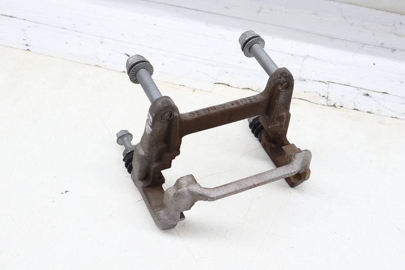 Brake Caliper Carrier / Bracket 80A615425A — Used (SKU 707724)