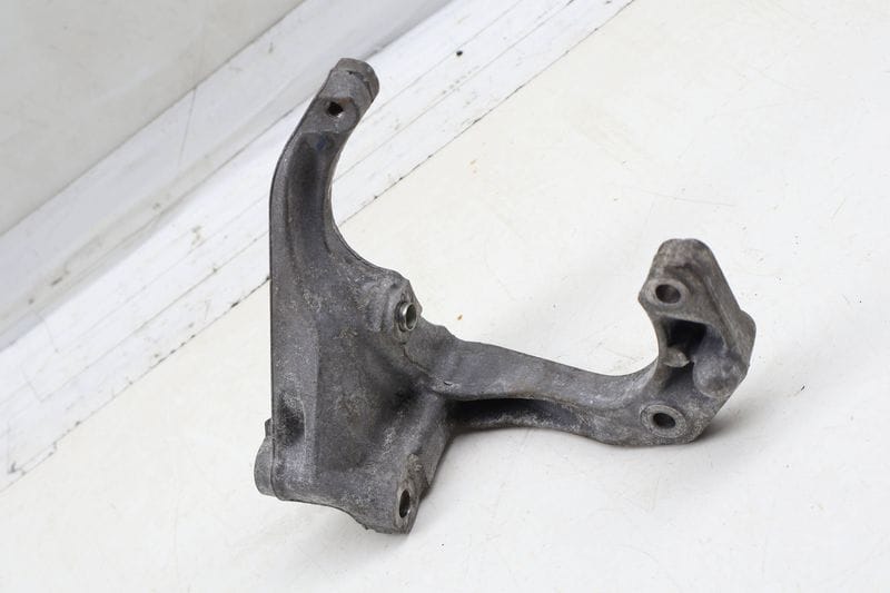 AC Compressor Mount / Bracket 06M260885M — Used (SKU 699822)