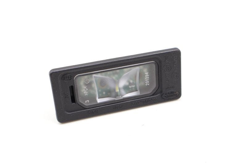 License Plate Light GX7313B627AB — Used (SKU 614343)