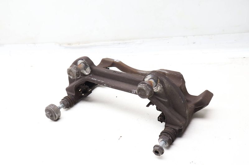Brake Caliper Carrier / Bracket 3QF615125A — Used (SKU 651032)