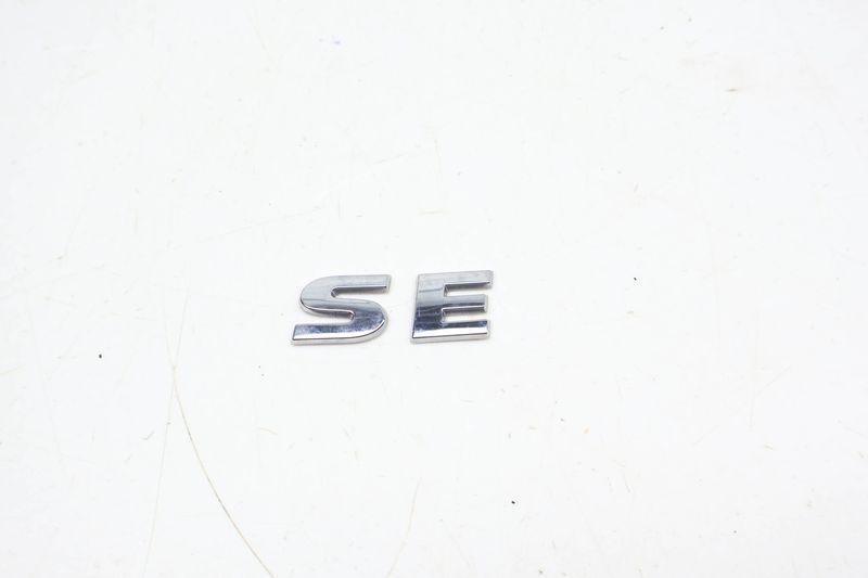 Trunk Emblem / Badge (SE) 5NN853687A — Used (SKU 694710)