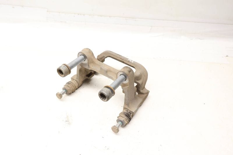 Brake Caliper Carrier / Bracket 5QM615425A — Used (SKU 690405)