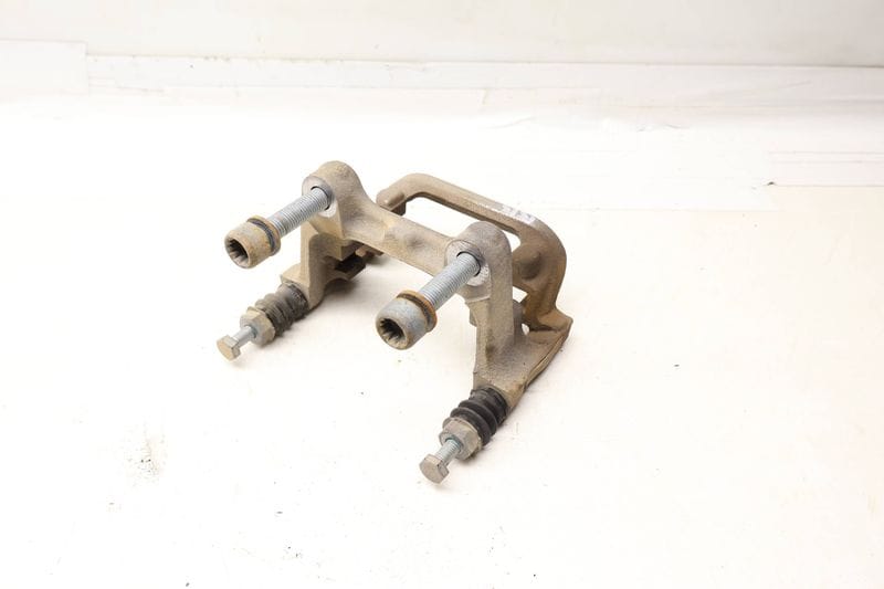 Brake Caliper Carrier / Bracket 5QM615426A — Used (SKU 690406)