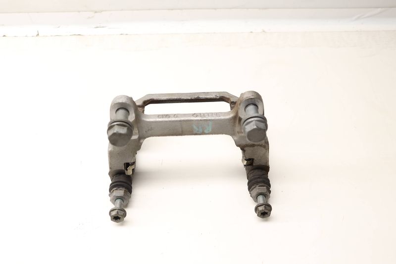Brake Caliper Carrier / Mount Bracket 8W0615426H — Used (SKU 606953)