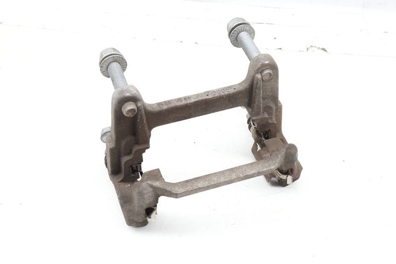 Brake Caliper Carrier / Bracket 80A615425D — Used (SKU 670475)
