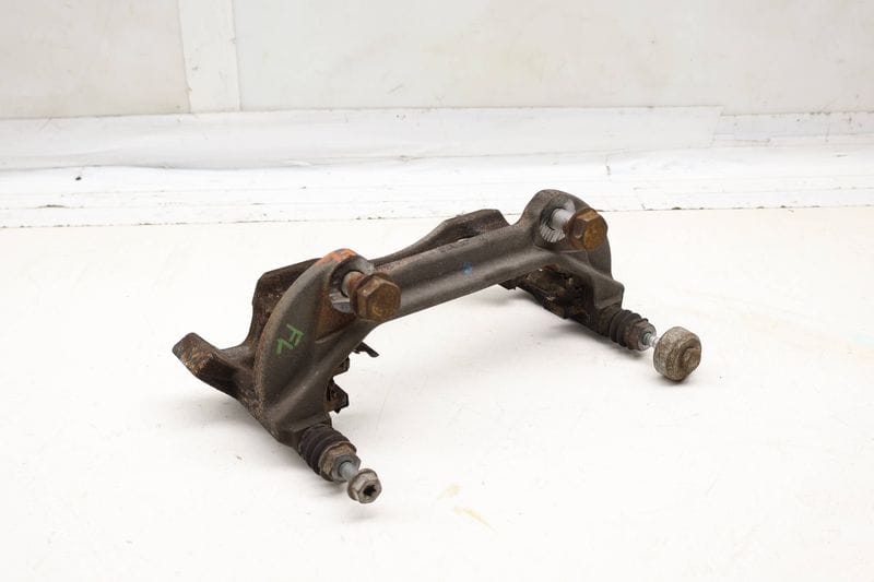 Brake Caliper Carrier / Bracket 3QF615125A — Used (SKU 706188)