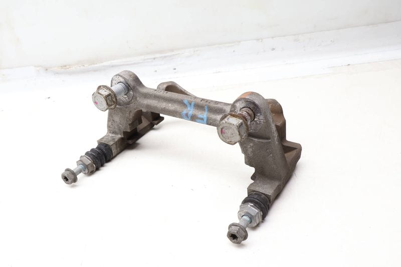Brake Caliper Carrier / Bracket 8V0615126A — Used (SKU 655089)