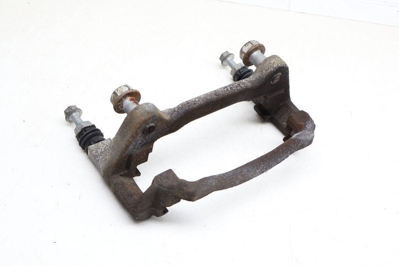 Brake Caliper Carrier / Bracket 8V0615125 — Used (SKU 679516)
