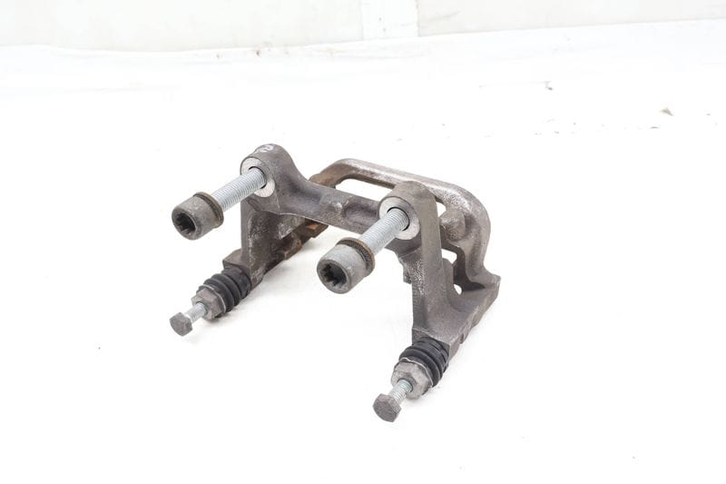 Brake Caliper Carrier / Bracket 5QM615425A — Used (SKU 669721)