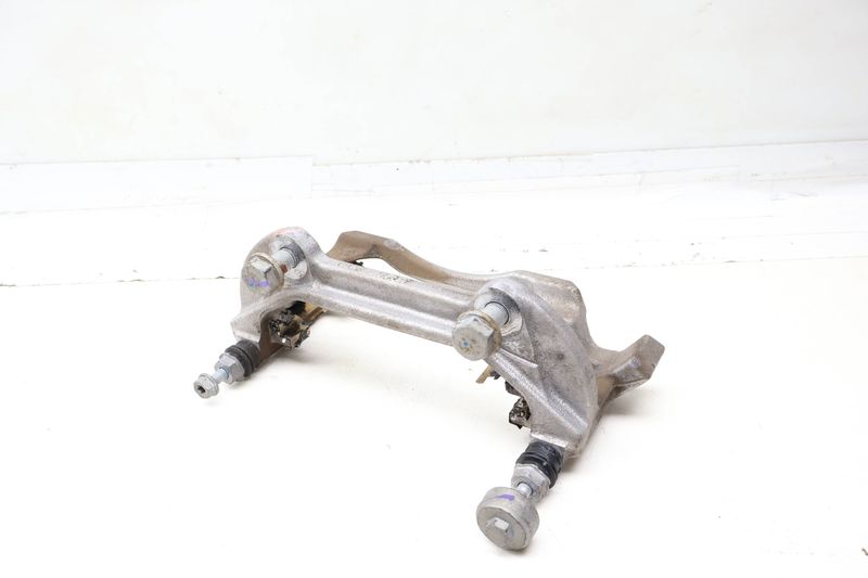 Brake Caliper Carrier / Bracket 3QF615125A — Used (SKU 703369)