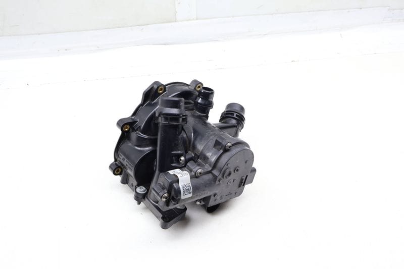 Coolant / Water Pump Housing 06L121111N — Used (SKU 694425)