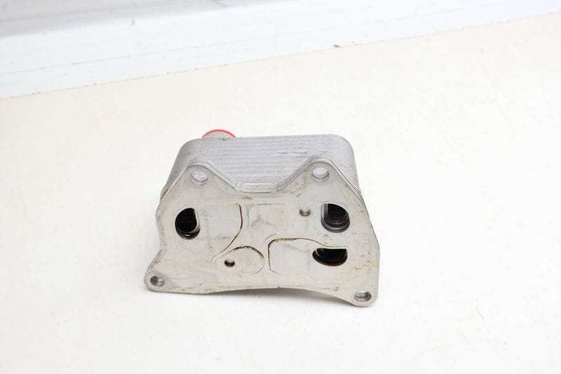 Engine Oil Cooler 06Q117021H — Used (SKU 694464)