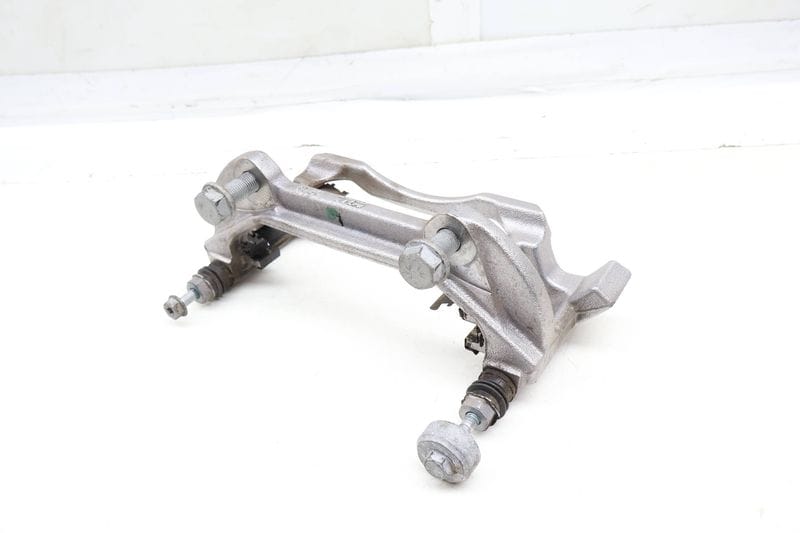 Brake Caliper Carrier / Bracket 3QF615125A — Used (SKU 697978)