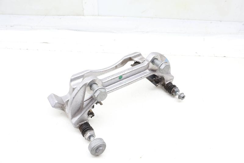 Brake Caliper Carrier / Bracket 3QF615126A — Used (SKU 697979)
