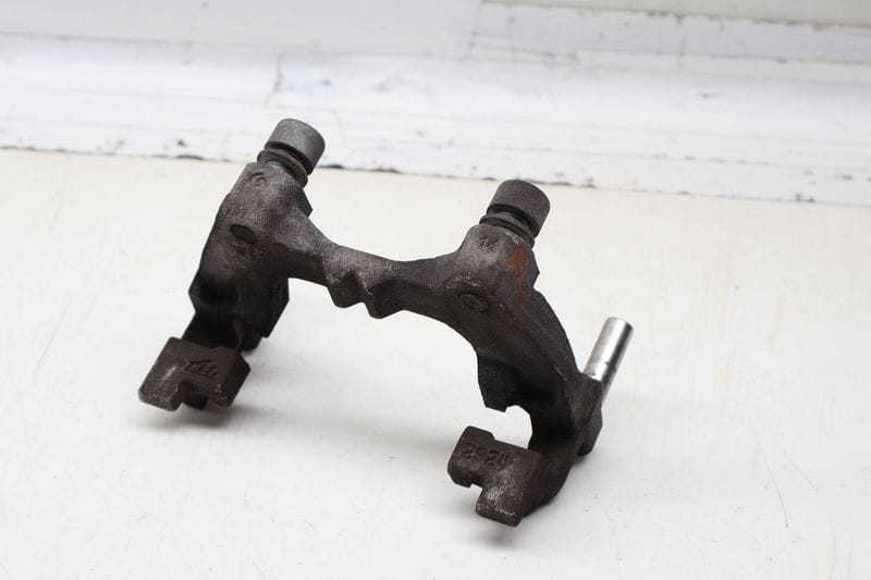 Brake Caliper Carrier / Bracket 8V0615425 — Used (SKU 724050)