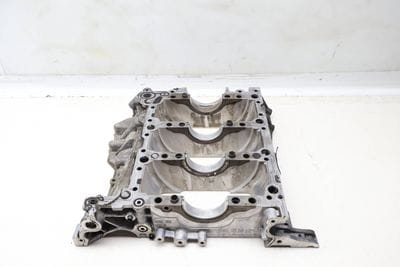 CRANKSHAFT MOUNT / LOWER ENGINE BLOCK 06E103032AE