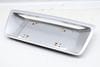 License Plate Mount Bracket / Trim 4E0853465F — photo 1